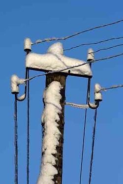 utility_poles_ice_and_snow