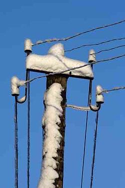 utility_poles_ice_and_snow