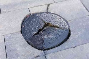 damaged manhole