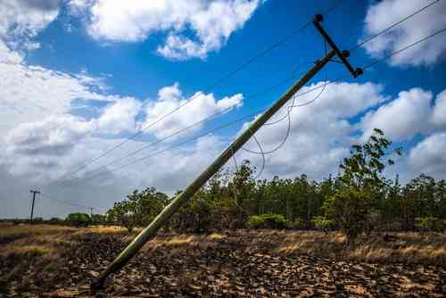 fallen utility pole from fire